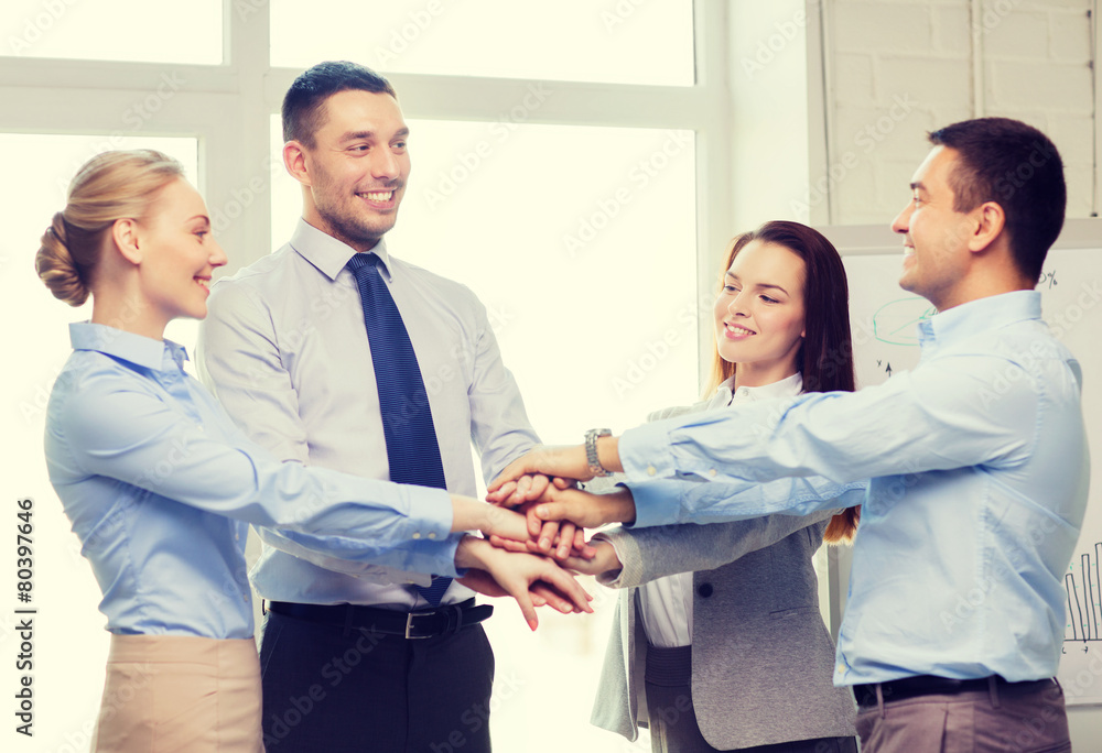 business team celebrating victory in office business team celebrating victory in office