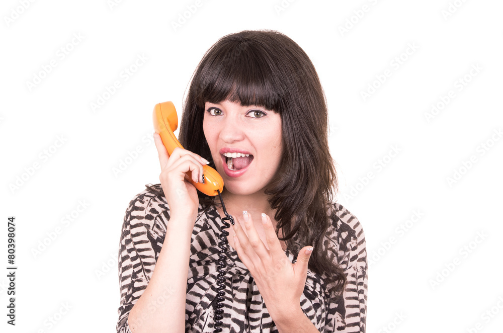 beautiful young woman using retro orange telephone beautiful young woman using retro orange telephone