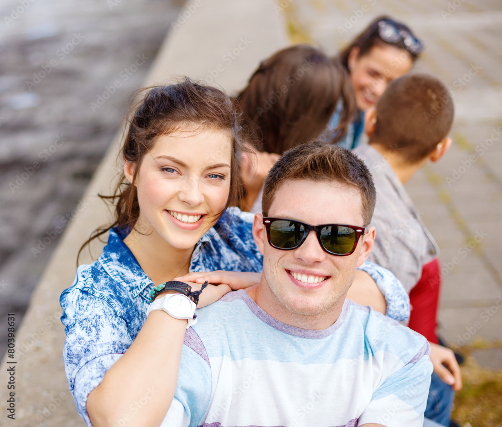 smiling teenagers in sunglasses having fun outside smiling teenagers in sunglasses having fun outside