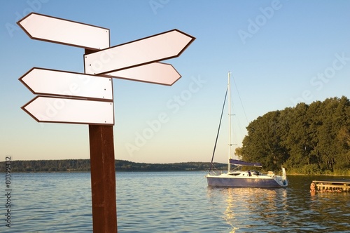 Guidepost on a lakeshore
