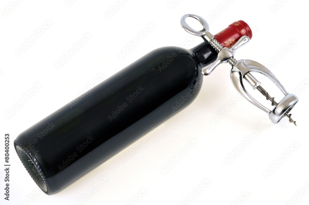 Tire-bouchon posé sur une bouteille de vin Tire-bouchon posé sur une bouteille de vin