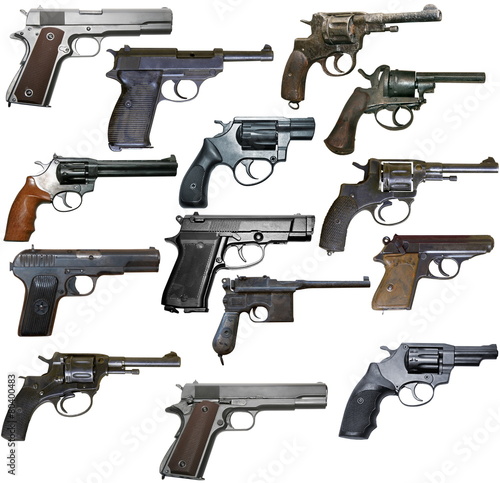Set of isolated vintage personal firearms of XX century on white photo