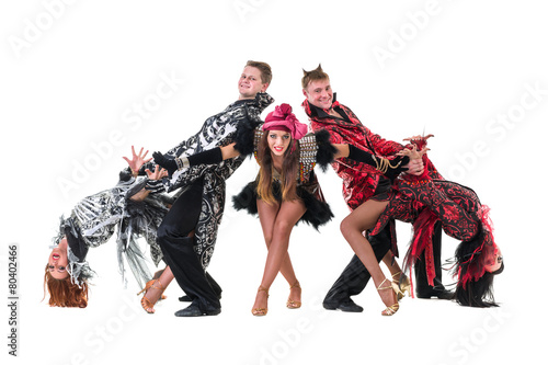 dancer team wearing carnival costumes dancing