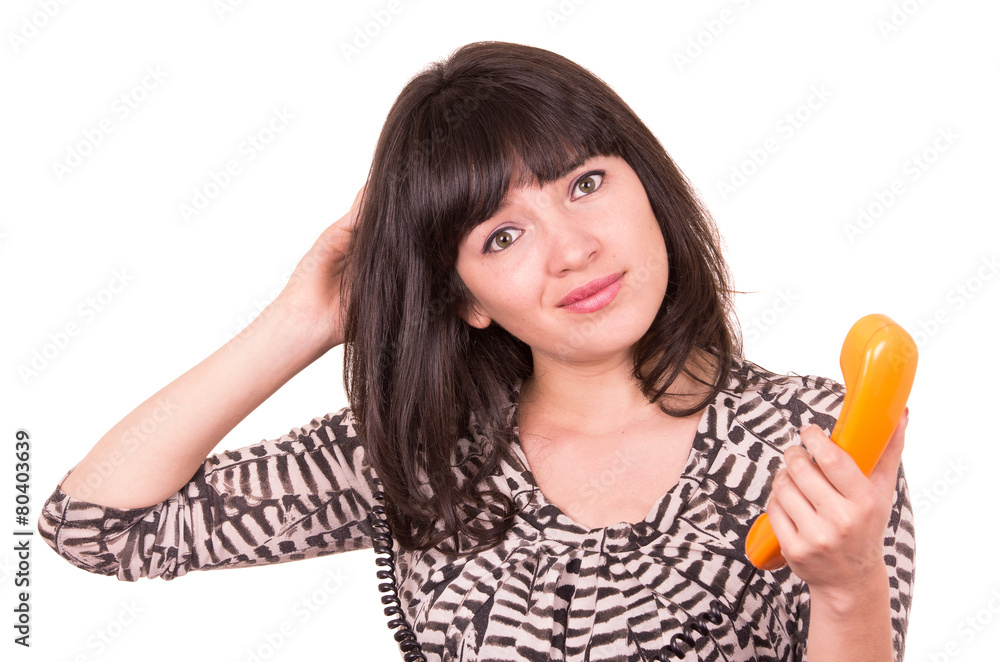 beautiful young woman using retro orange telephone beautiful young woman using retro orange telephone