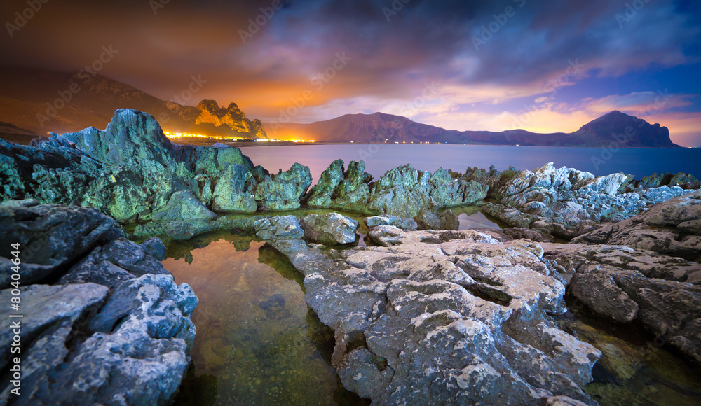 Night view of coast near the town Macari