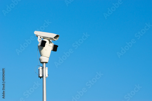 Surveillance Camera and Blue Sky