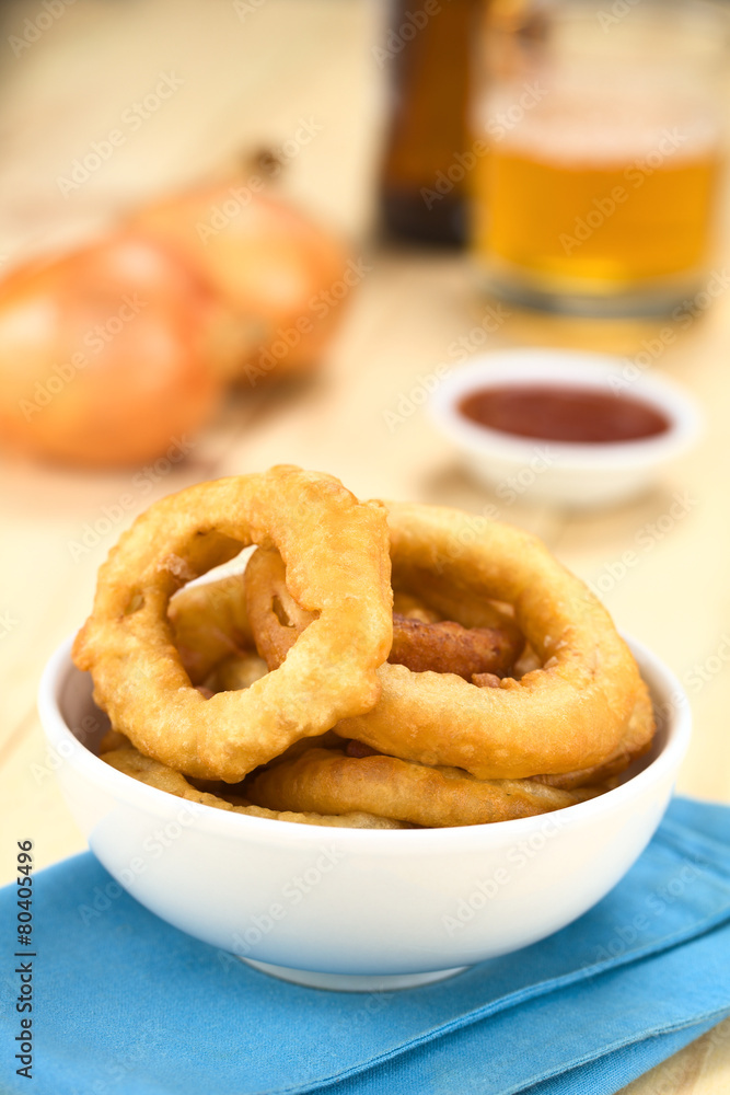 Freshly prepared homemade beer-battered onion rings Freshly prepared homemade beer-battered onion rings