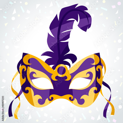 Festive carnival mask on background of confetti