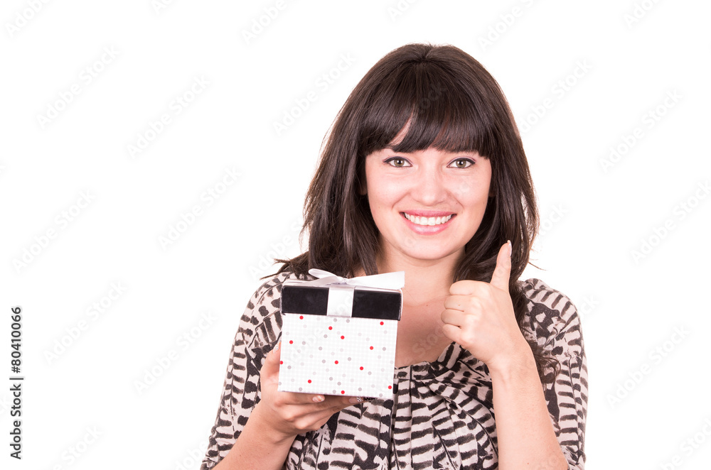 beautiful young happy girl holding present wrapped in a box beautiful young happy girl holding present wrapped in a box