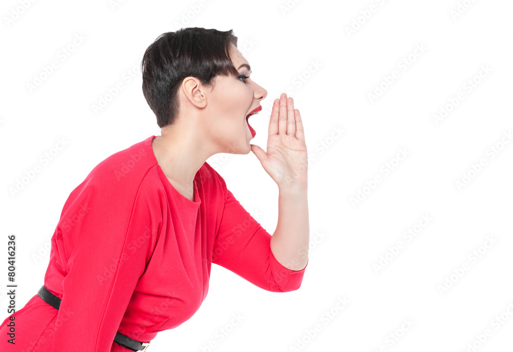 Beautiful plus size woman shouting through megaphone shaped hand Beautiful plus size woman shouting through megaphone shaped hand