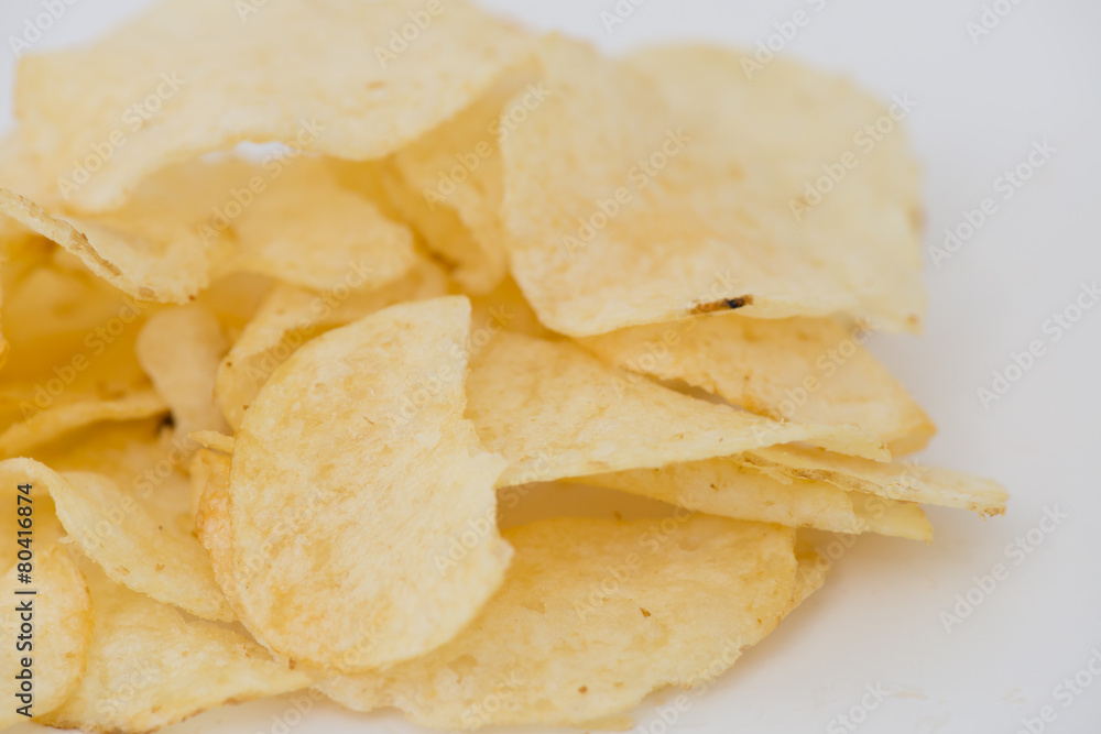 Potato chips isolated on white background Potato chips isolated on white background