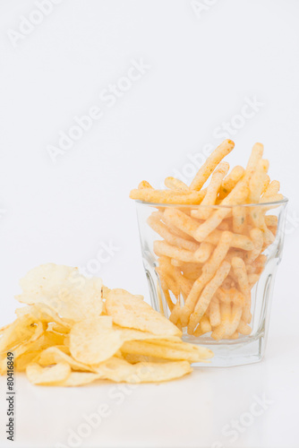 Potato chips isolated on white background photo