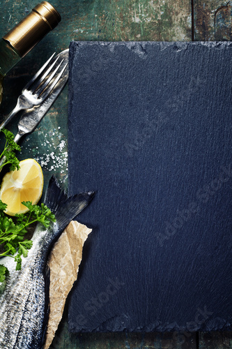 Fototapeta Naklejka Na Ścianę i Meble -  Food background with Fish and Wine
