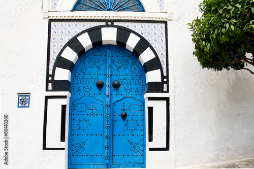Blue doors and white wall of building in Sidi Bou Said, Tunisia