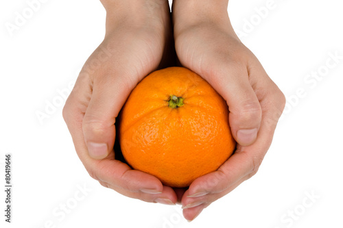 orange in hands