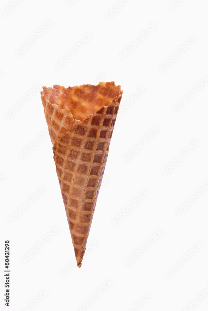 Empty sugar waffle cone isolated on white background Empty sugar waffle cone isolated on white background