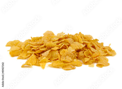 Bunch of corn flake cereals on a white background