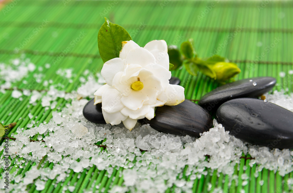 Spa setting with stones and many salt with on mat Spa setting with stones and many salt with on mat