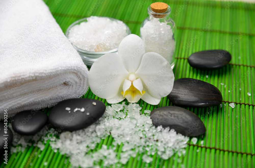 SPA set on green mat with white salt SPA set on green mat with white salt
