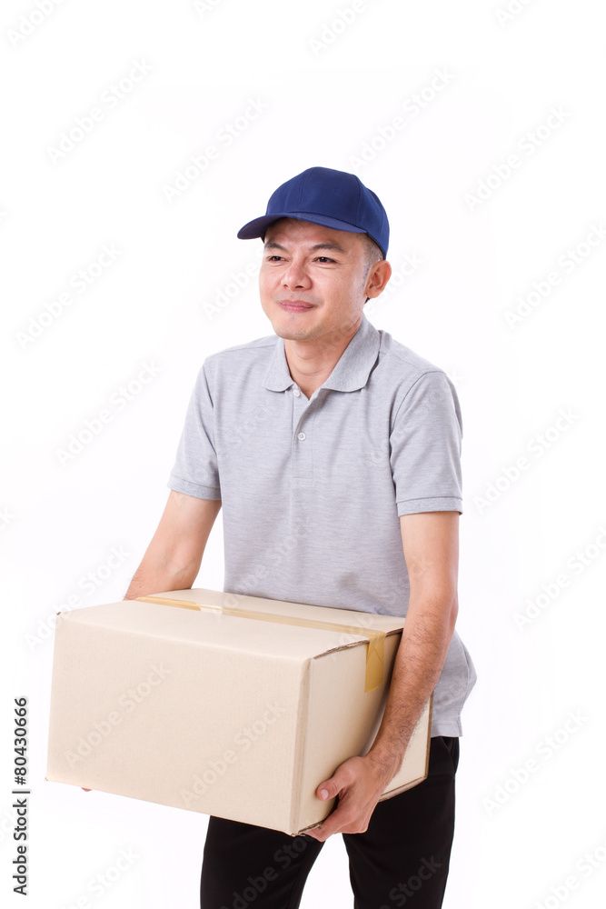 unhappy man carrying heavy carton box or cardboard box unhappy man carrying heavy carton box or cardboard box