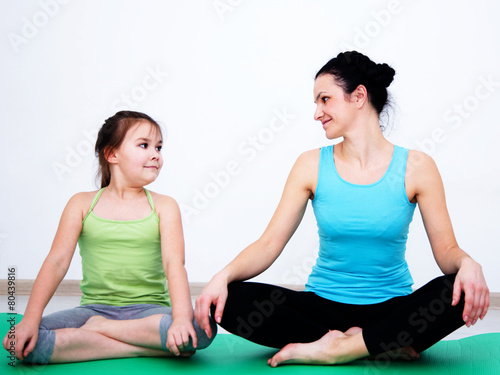 Mother and daughter doing exercise