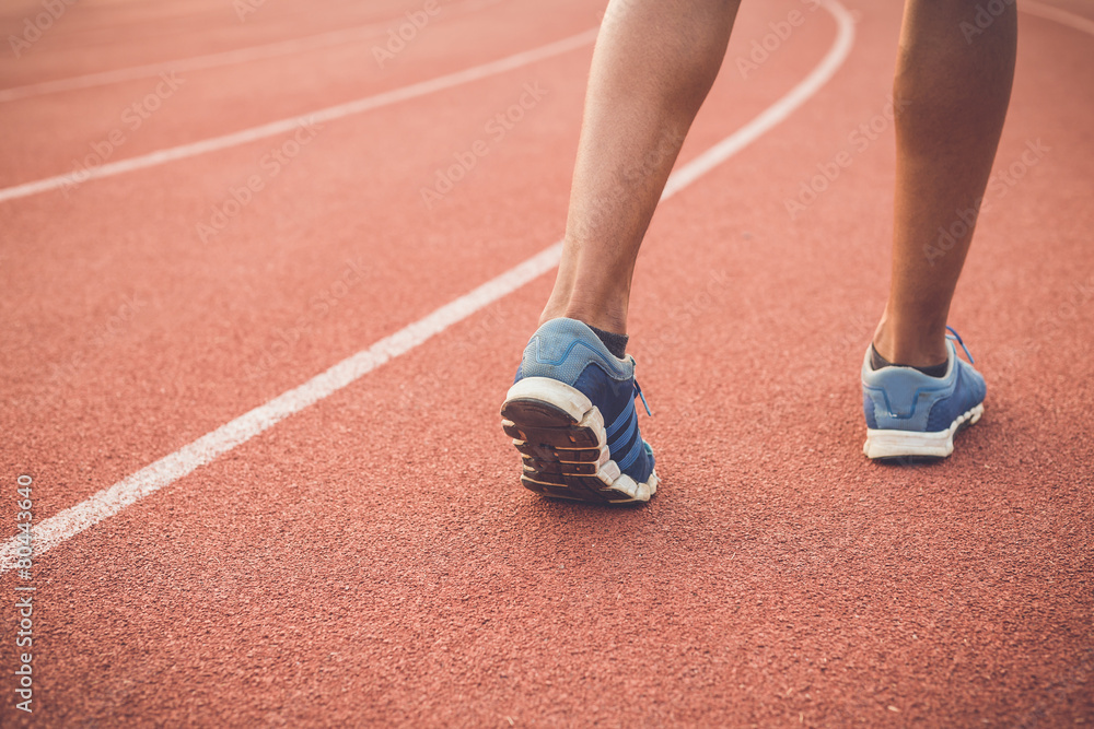 Runner feet on running stadium