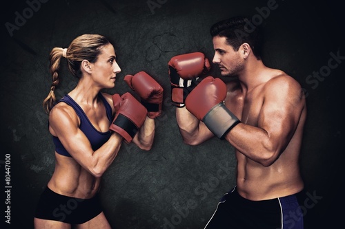 Composite image of boxing couple © WavebreakmediaMicro