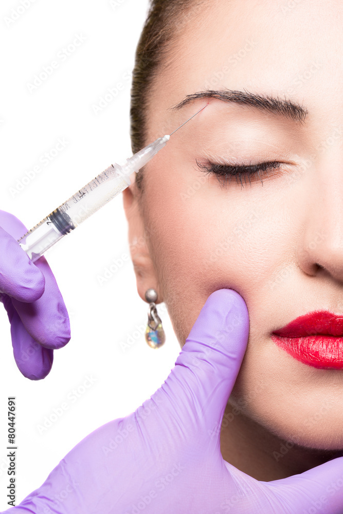 Woman gets cosmetic injection. Beauty Treatment Woman gets cosmetic injection. Beauty Treatment