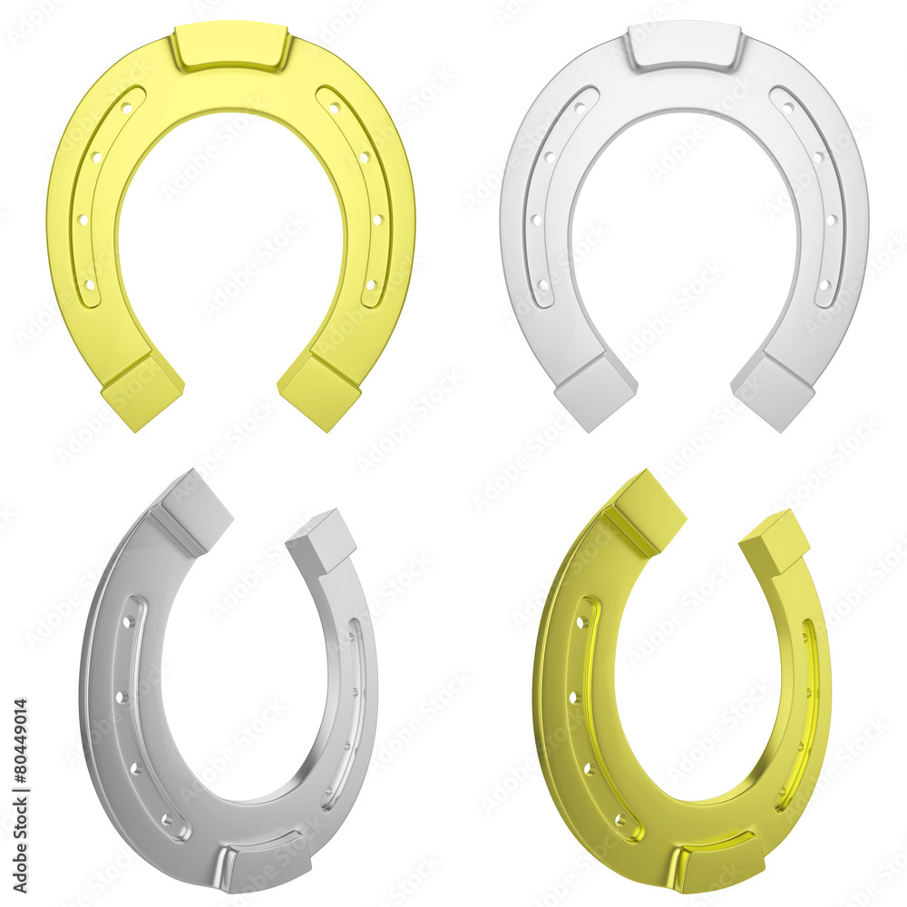 The group, a set of gold and silver horseshoe isolated The group, a set of gold and silver horseshoe isolated