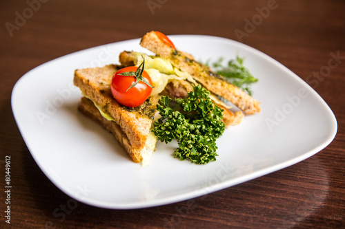 breakfast sandwich on wooden background