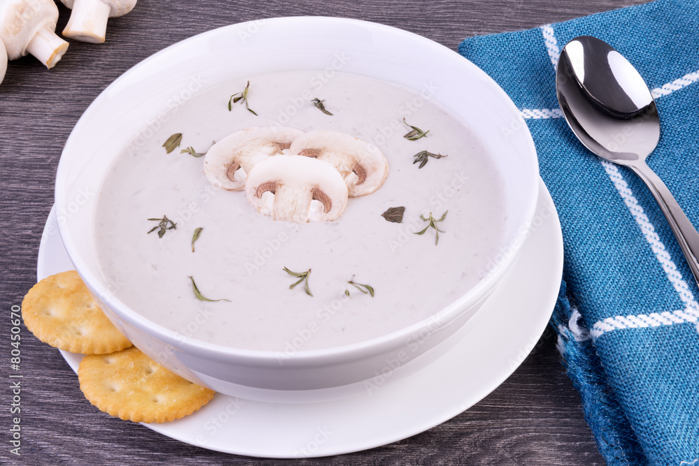 Fresh cream of mushroom soup in a white bowl Fresh cream of mushroom soup in a white bowl