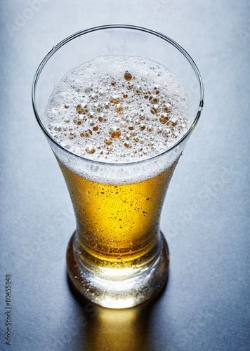 glass full of beer, view from above