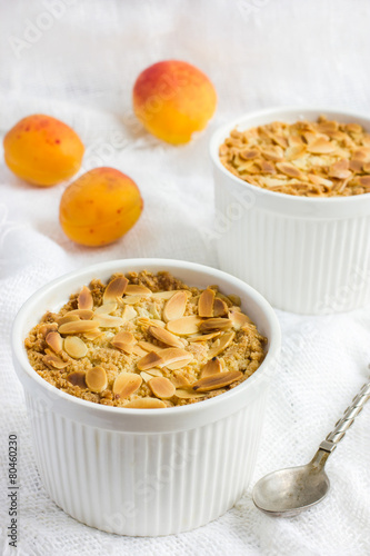 apricot crumbl with fried almond flakes photo