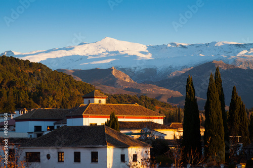 Granada in evening with Sierra Nevada in  background