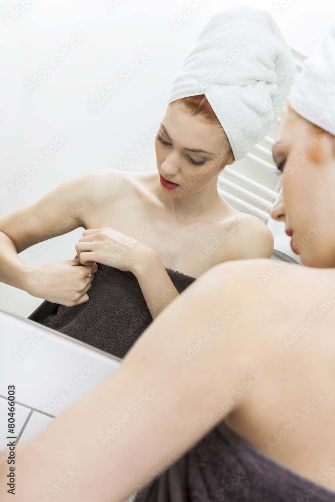 Woman From Shower Looking her Face at the Mirror Woman From Shower Looking her Face at the Mirror