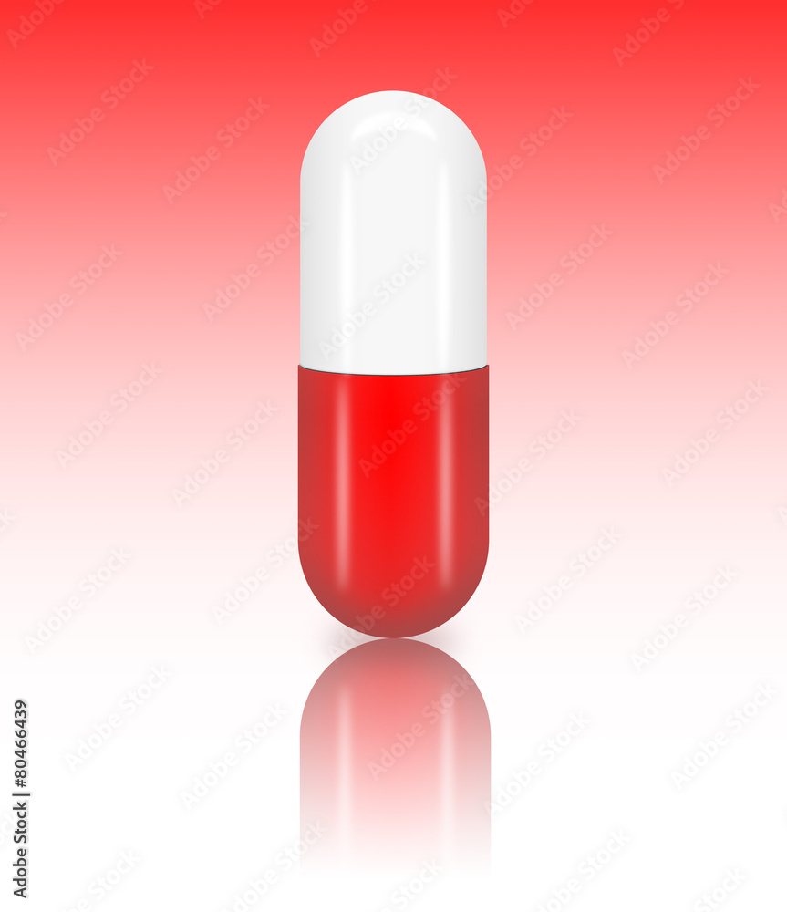Medicine pill (capsule) with a reflection on gradient table Medicine pill (capsule) with a reflection on gradient table