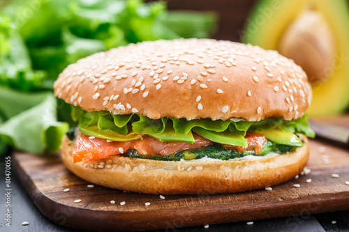 Burger with salmon and avocado