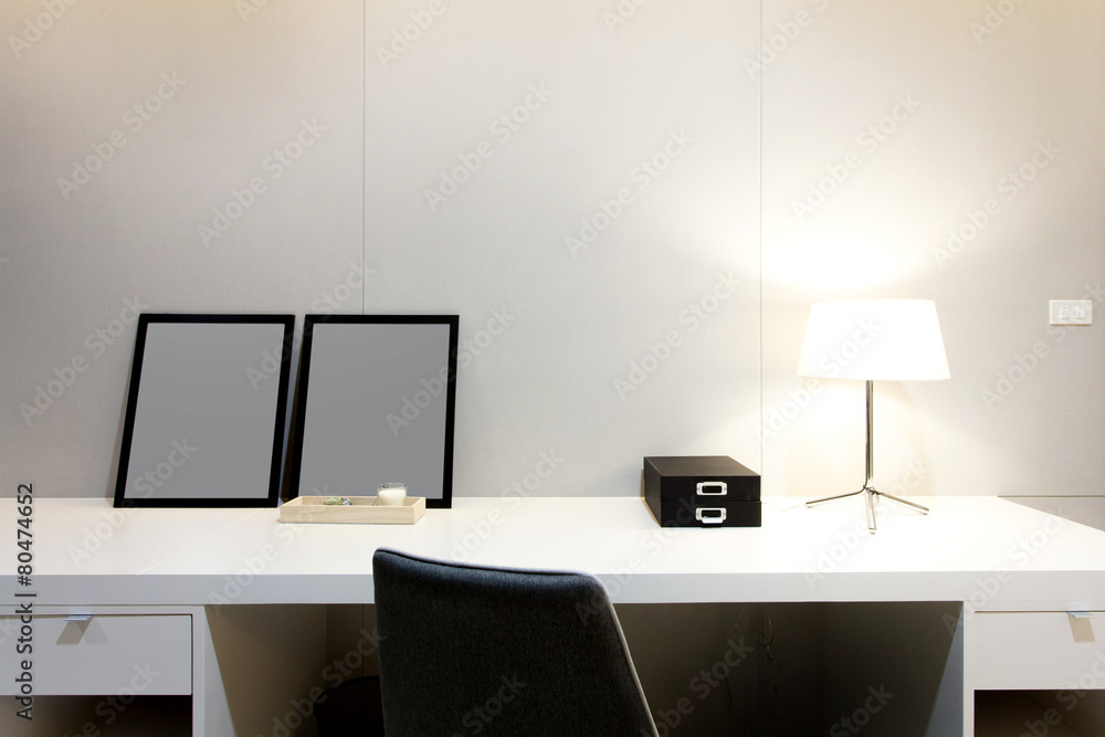 Workspace with desk lamp on home or studio