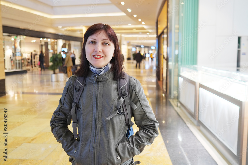 Fototapeta premium Smiling woman at the Shopping Mall