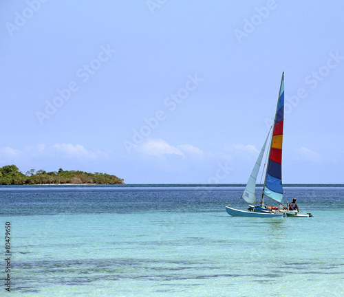 Colorful catamaran on azure water