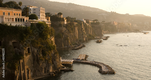 Sun sets over the bay in Sorrento, Campania, Italy.