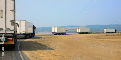 trucks move on  mountain road