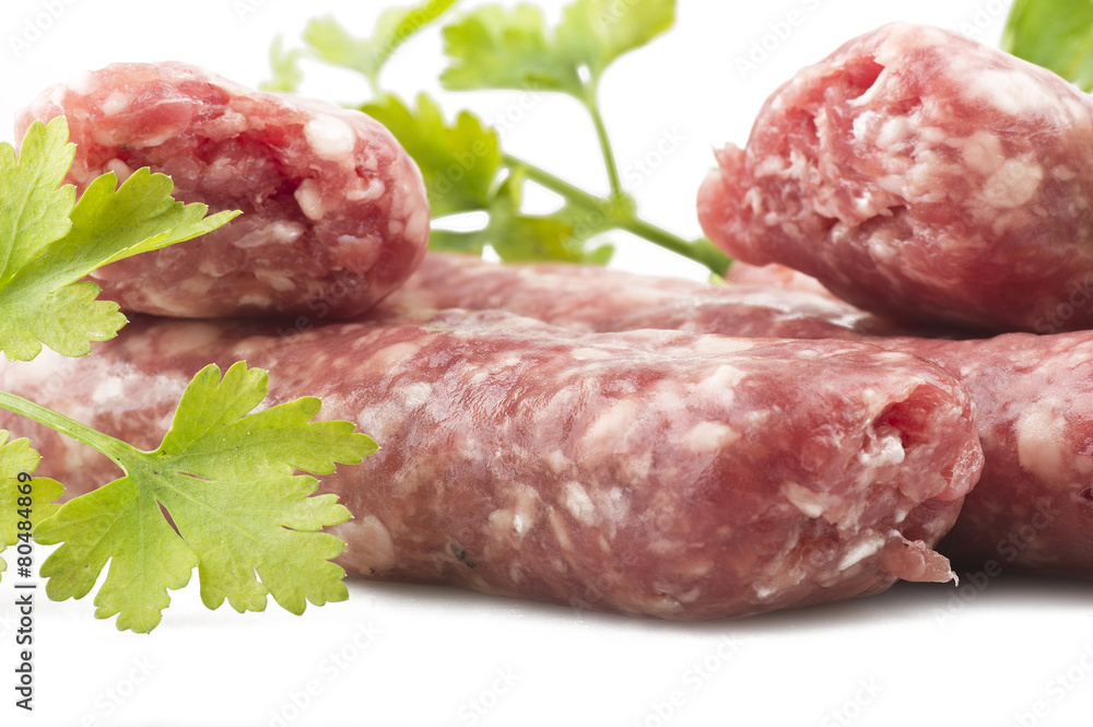 sausage with parsley leaves on the white sausage with parsley leaves on the white