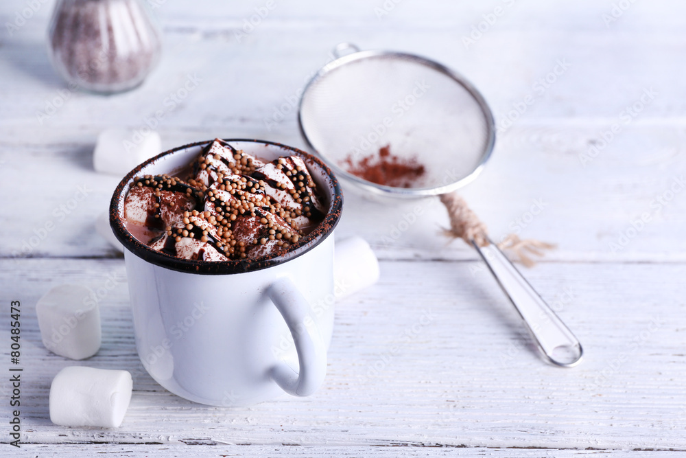 Mug of cocoa with marshmallows on wooden background Mug of cocoa with marshmallows on wooden background