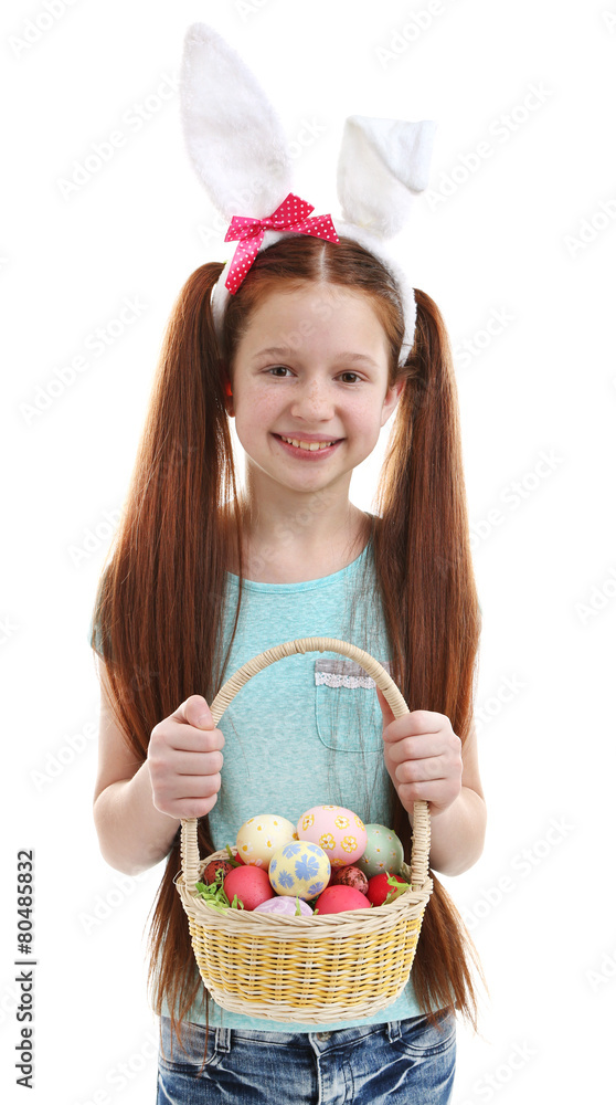Beautiful little girl wearing Easter bunny ears and holding Beautiful little girl wearing Easter bunny ears and holding