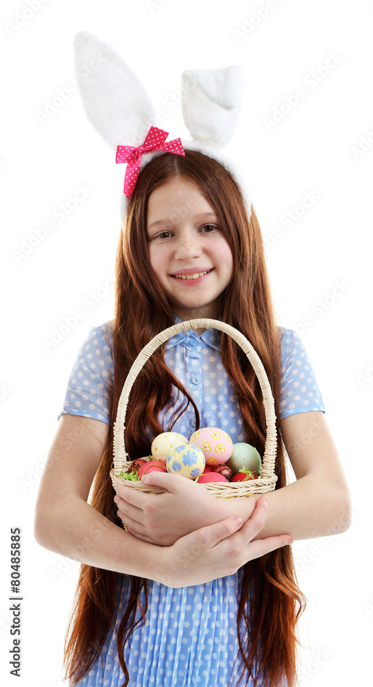 Beautiful little girl wearing Easter bunny ears and holding Beautiful little girl wearing Easter bunny ears and holding