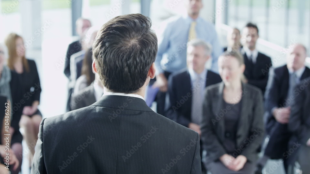 Diverse group of business people attend a business seminar Diverse group of business people attend a business seminar