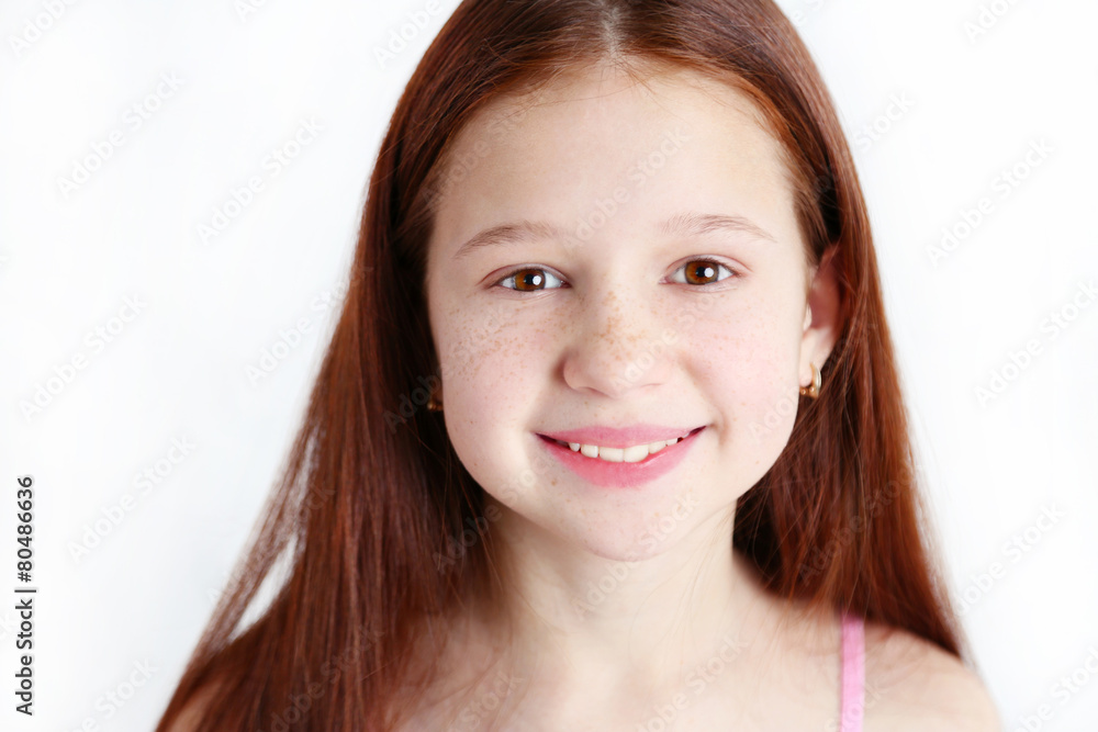 Beautiful little girl on bricks wall background Beautiful little girl on bricks wall background
