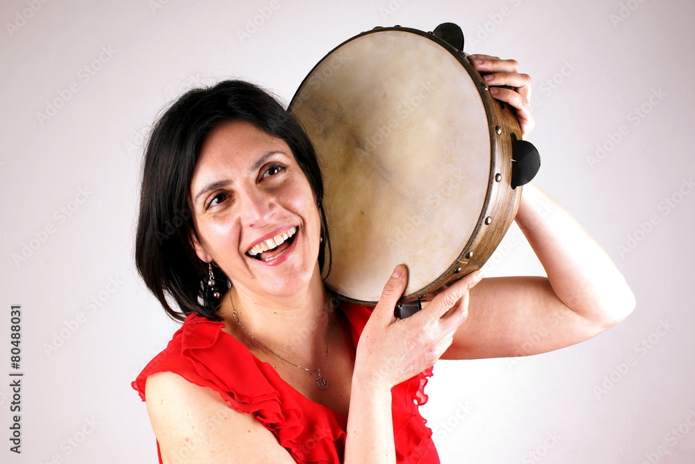 Naklejka premium Woman with tambourine