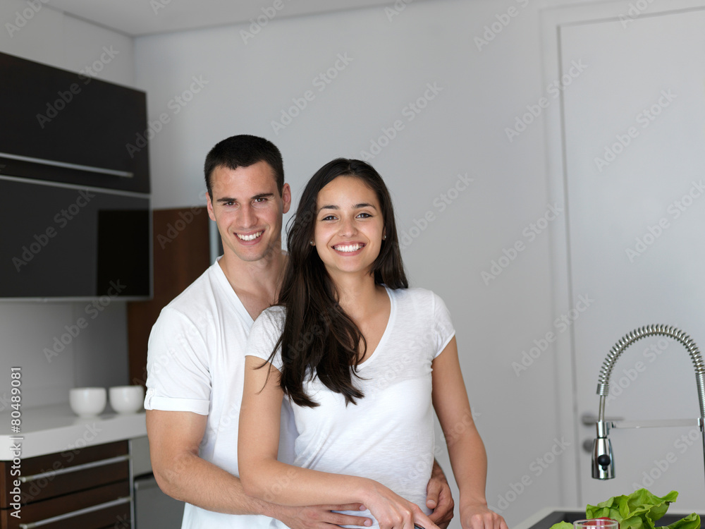 happy young couple in kicthen happy young couple in kicthen